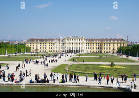 VIENNA, AUSTRIA - APR 30th, 2017: Schonbrunn Palace with Neptune Fountain in Vienna. It's a former imperial 1441-room Rococo summer residence of Sissi Empress Elisabeth of Austria in modern Wien Schoenbrunn Stock Photo