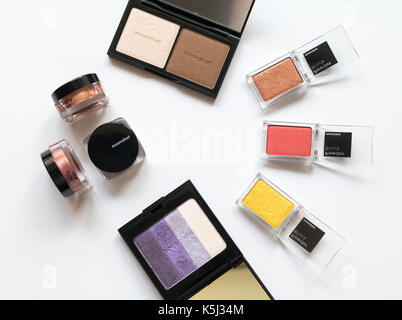 Eyeshadows creamy and powdery with bronzer and prowder Stock Photo