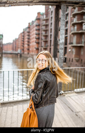 Business woman on the iron bridge Stock Photo