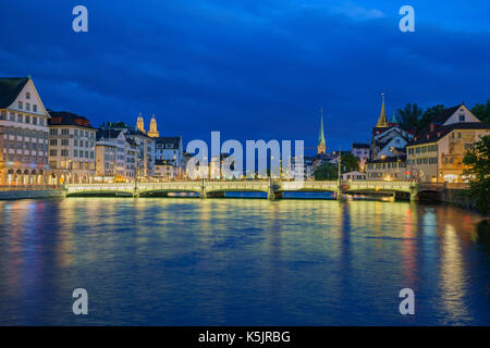 Night cityscape with Limmat river of the historical Zurich city, Switzerland Stock Photo