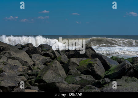 Waves from the Atlantic Ocean roar onto the beaches and jetties of Spring Lake. Stock Photo