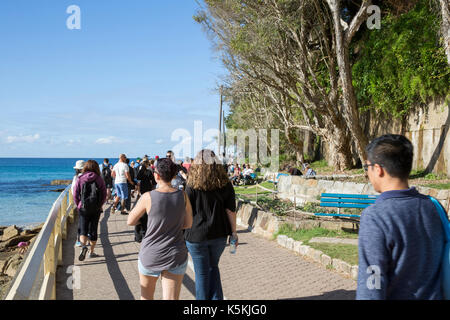 People enjoying the coastal walk from Manly beach to Shelley beach, Sydney,Australia Stock Photo
