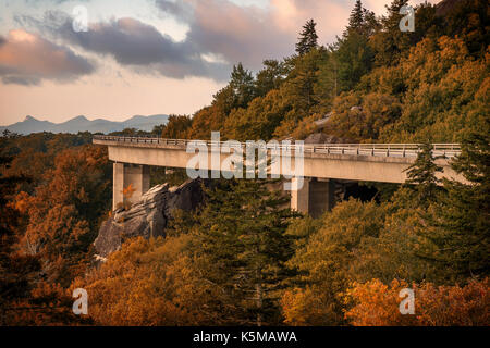 Linn Cove Viaduct Early Autumn Colorful Leaves - Blue Ridge Mountain Fall Leaf Color on Blue Ridge Parkway Orange,Green,Brown Table Rock  & Hawksbill Stock Photo