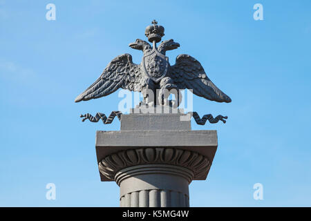 Two-headed eagle, Russian coat of arms with a rider on board. Symbol of imperial Russia. Decoration of Summer Garden fence. Built in 1825 by architect Stock Photo
