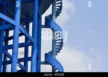 Blue Spiral Staircase on Elevated Water Tank Stock Photo