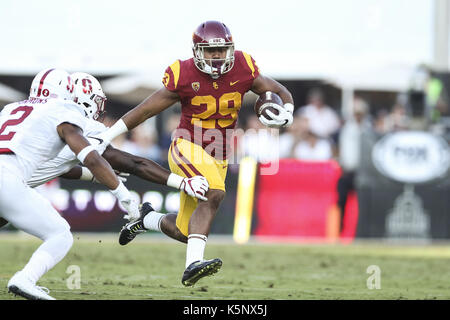 Los Angeles, CA, US, USA. 9th Sep, 2017. September 9, 2017: USC Trojans running back Vavae Malepeai (29) tries to evade a tackler in the game between the Stanford Cardinal and the USC Trojans, The Los Angeles Memorial Coliseum in Los Angeles, CA. Peter Joneleit/ Zuma Wire Service Credit: Peter Joneleit/ZUMA Wire/Alamy Live News Stock Photo