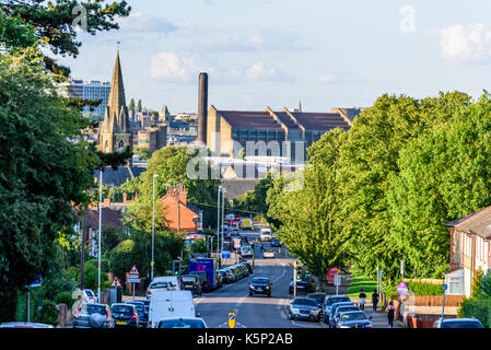 Northampton UK - Aug 15 2017: Cloudy Day Cityscape View of Northampton UK with road in foreground. Stock Photo