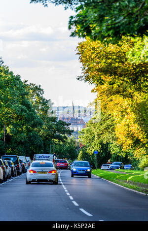 Northampton UK - Aug 15 2017: Cloudy Day Cityscape View of Northampton UK with road in foreground. Stock Photo