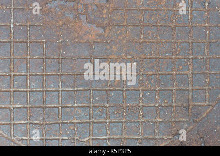 Background from rusty cast iron with the checkered relief drawing Stock Photo