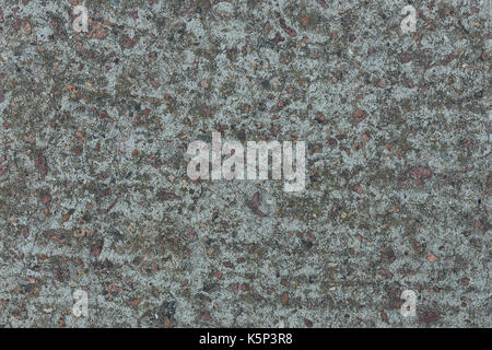 Background from concrete with impregnations from red granite gravel Stock Photo