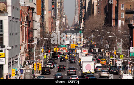 View looking north over 10th Avenue from High Line Park in New York City Stock Photo