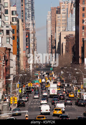 View looking north over 10th Avenue from High Line Park in New York City Stock Photo