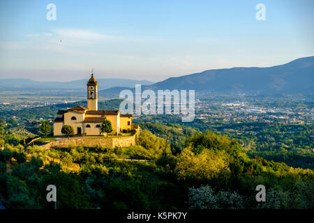 The church Santa Maria is located on a hill beside the village, overlooking the valley Val di Pescia below