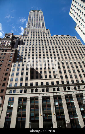Trump Building on Wall Street in New york - USA Stock Photo