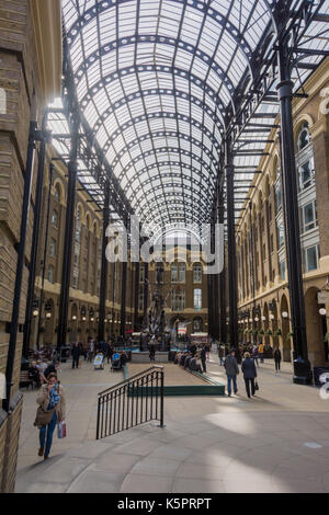 London, UK, October 10: View of the public open air Hay's Galleria. Originally a warehouse, it was converted to a major visitor attraction in the 1980 Stock Photo