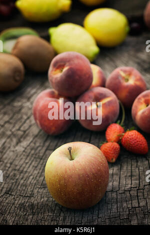 Healthy organic food. Fresh fruit on wood. Stock Photo