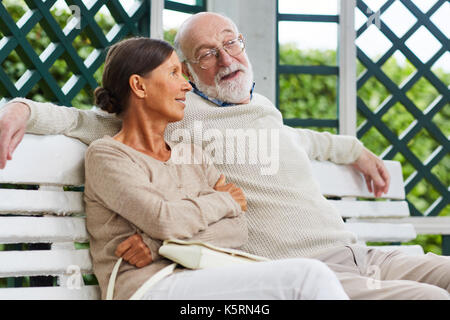Relaxing on bench Stock Photo