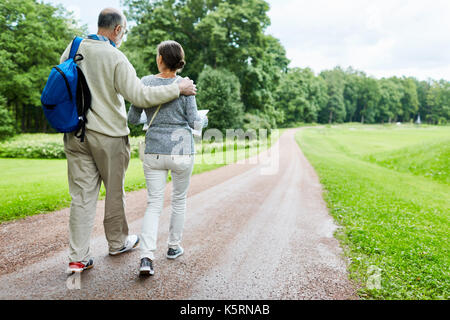 Walking down country road Stock Photo