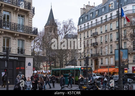 Shoppers on the lively Boulevard Saint Germain des Pres in Paris, France, just before Christmas. Stock Photo