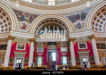 MOSTA, MALTA - AUGUST 21, 2017: The dome of the Rotunda of Mosta (Church of the Assumption of Our Lady) is the third largest unsupported dome in the W Stock Photo