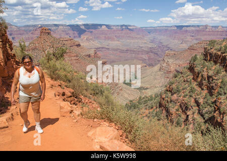 Asian woman hiking on the Bright Angel Trail in the Grand Canyon Stock Photo