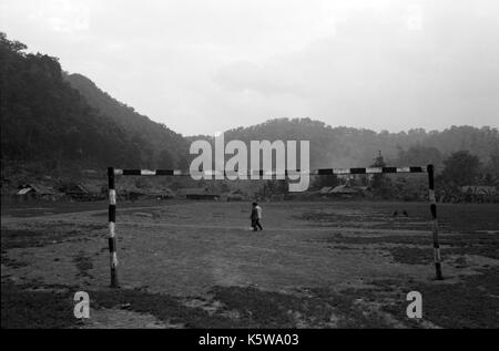 Soccer field beside a Medècins Sans Frontiéres hospital in Mae La Burmese refugee camp in northwest Thailand. September, 1996. Stock Photo