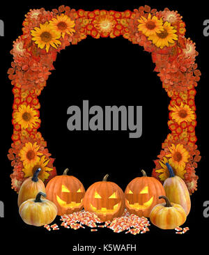 Scary Halloween frame with grinning jack-o-lanterns and dried flowers in fall colors on a black background Stock Photo