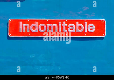 british railways locomotive badges and engine train traction plates with the names on them british rail, southern region, indomitable names plates Stock Photo