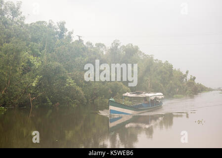 Boat in the Pangalanes Canal, Madagascar Stock Photo