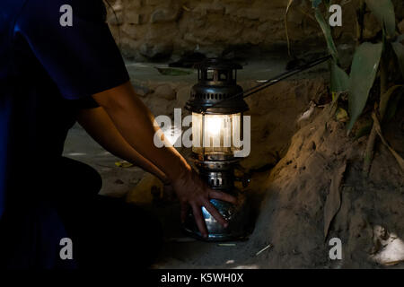 Beautiful Lod Cave in Soppong close to touristic Pai village full of rock. Firing traditional lamp in Lod Cave Stock Photo