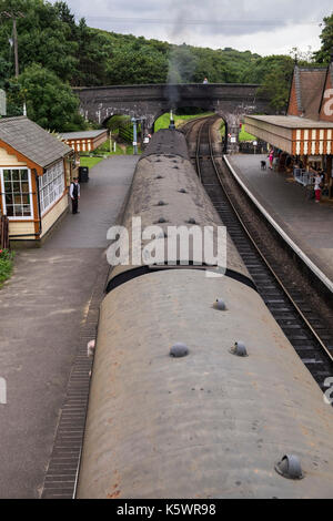 Overhead view of Y14 steam locomotive pulling out of Weybourne station, North Norfolk Railway, train station, England, UK Stock Photo