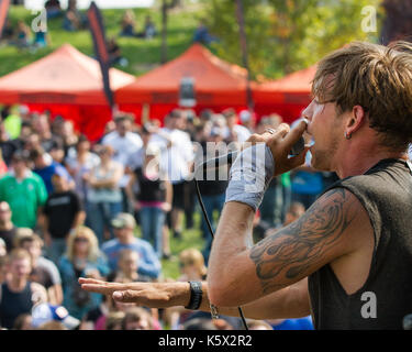 Rob Ulrich on stage performing for his fans Stock Photo