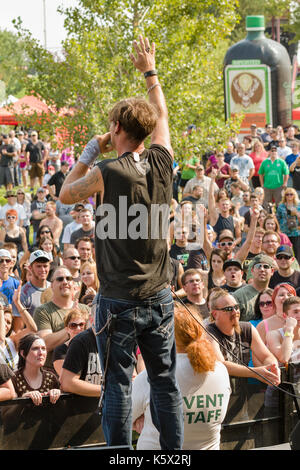 Rob Ulrich on stage performing for his fans Stock Photo