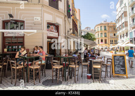 Outdoor eating at a restaurant in Malaga, Spain Stock Photo