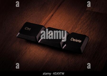 Ctrl alt del on wood surface Stock Photo