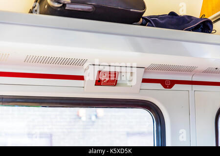 Pull handle to stop train, Train alarm, train stop handle, emergency stop on train, emergency stop handle, train emergency stop, train alarm, alarm Stock Photo