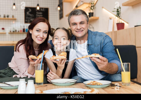 eating pizza Stock Photo