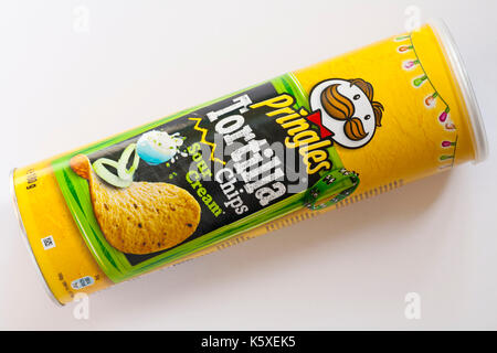 tub of Pringles Tortilla Chips sour cream isolated on white background Stock Photo