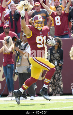 Washington Redskins outside linebacker Ryan Kerrigan (91) sheds the block  of Chicago Bears tight end Trey Burton (80) in fourth quarter action at  FedEx Field in Landover, Maryland on Monday, September 23