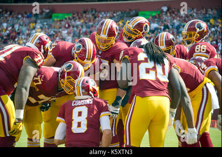 Landrover, Maryland, USA. 10th Sep, 2017. Washington Redskins quarterback Kirk Cousins (8) calls signals in the huddle early in the fourth quarter against the Philadelphia Eagles at FedEx Field in Landover, Maryland on Sunday, September 10, 2017. The Eagles won the game 30 - 17. Credit: Ron Sachs/CNP - NO WIRE SERVICE - Photo: Ron Sachs/Consolidated News Photos/Ron Sachs - CNP Credit: dpa picture alliance/Alamy Live News Stock Photo