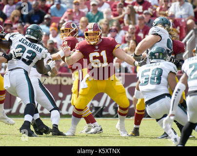 Landrover, Maryland, USA. 10th Sep, 2017. Washington Redskins center Spencer Long (61) blocks for Redskins quarterback Kirk Cousins (8) in third quarter action against the Washington Redskins at FedEx Field in Landover, Maryland on Sunday, September 10, 2017. The Eagles won the game 30 - 17. Credit: Ron Sachs/CNP - NO WIRE SERVICE - Photo: Ron Sachs/Consolidated News Photos/Ron Sachs - CNP Credit: dpa picture alliance/Alamy Live News Stock Photo