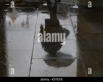 Reflections after the rain in a London street Stock Photo
