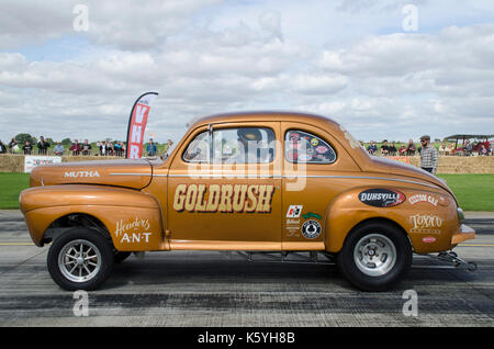 Hot Rod drag racing at Atomic Vintage Festival, including burnouts from the gasser circus. Stock Photo