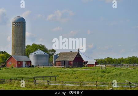 Modern Farm in Nebraska with barn, silo, and field Stock Photo