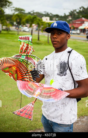 Young men showing a plastic plane Stock Photo