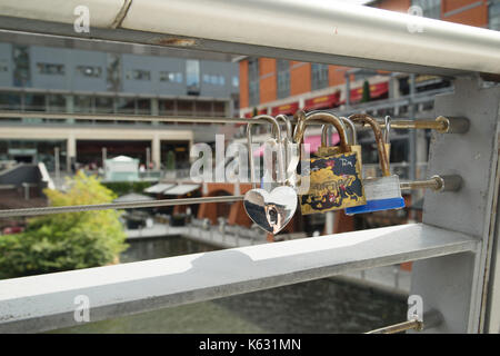 Love locks on a canal bridge in Birmingham, West Midlands, England Stock Photo