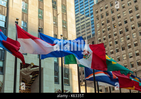 Flags of the world nations fly at the Rockefeller Center in New York City, New York. Stock Photo