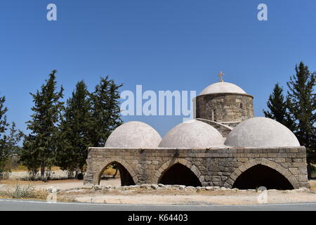 The 15th-century church of Agia Aikaterini in the village of Kritou Tera, Cyprus. Photograph taken under a clear blue sky. Stock Photo