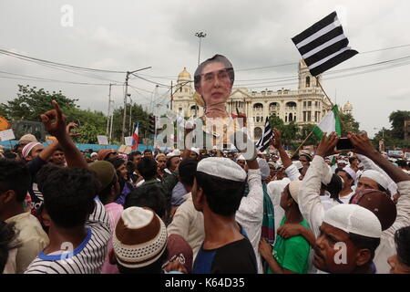 West Bengal Muslims gathered today at Kolkata and showing great protest on the Rohingya issue against the State Counsellor of Myanmar Aung San Suu Kyi on September 11 , 2017. Stock Photo