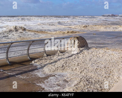 Blackpool, UK. 11th Sep, 2017. UK weather. Strong to gale force winds affecting the Lancashire coastal resort town of Blackpool today. The gales have created large puddles of sea foam along the promenade in the central and south shore areas of the resort. Conditions are expected to improve and a brief respite before a rapidly developing storm is forecast to hit the area late Tuesday night and the early hours of Wednesday morning. The met office has issued a yellow warning for the event. Credit: Gary Telford/Alamy Live News Stock Photo